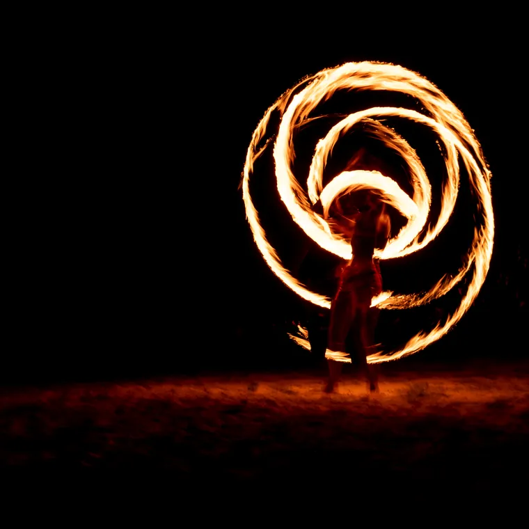 Fire spinning after dark